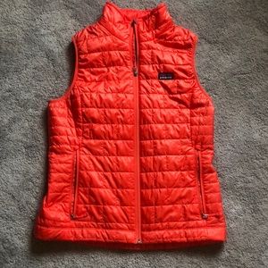 Patagonia vest, bright orange medium.